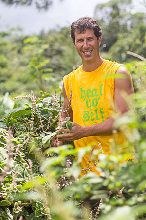 Doug in Heal Yo Self tshirt in Kauai Farmacy Garden