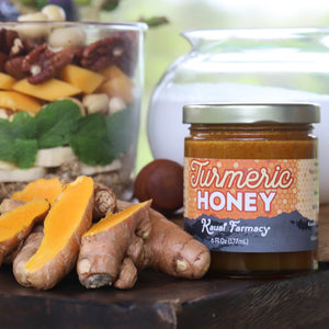Turmeric honey spiced medicinal breakfast bowl fruit nuts root